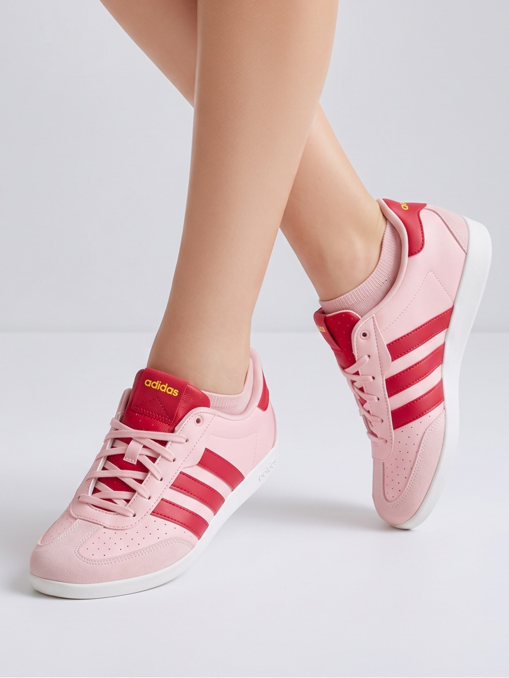 adidas Women’s Pink Sneakers with Red Stripes